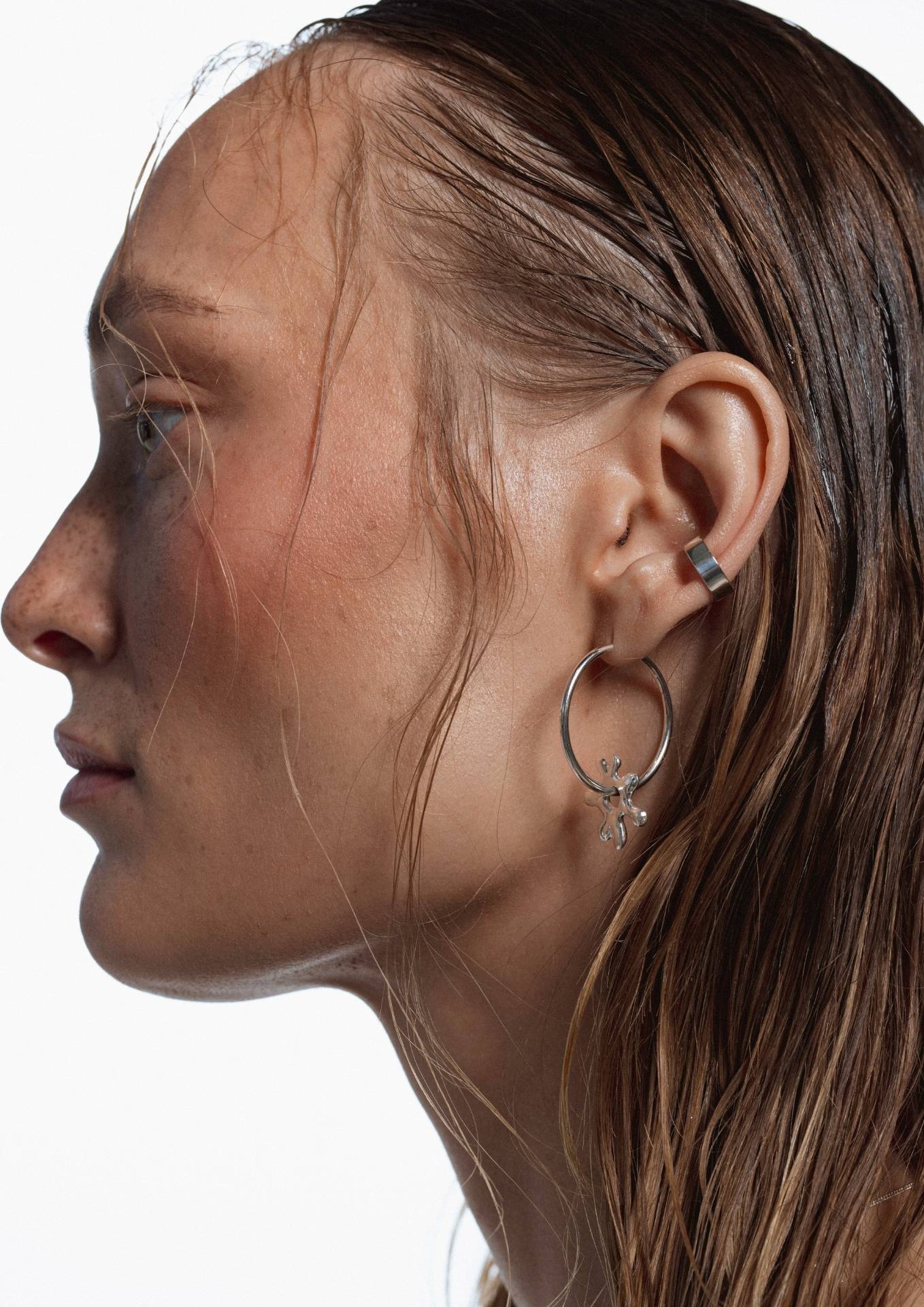 NO MORE accessories Sea Flower Nomad Hoops in Silver