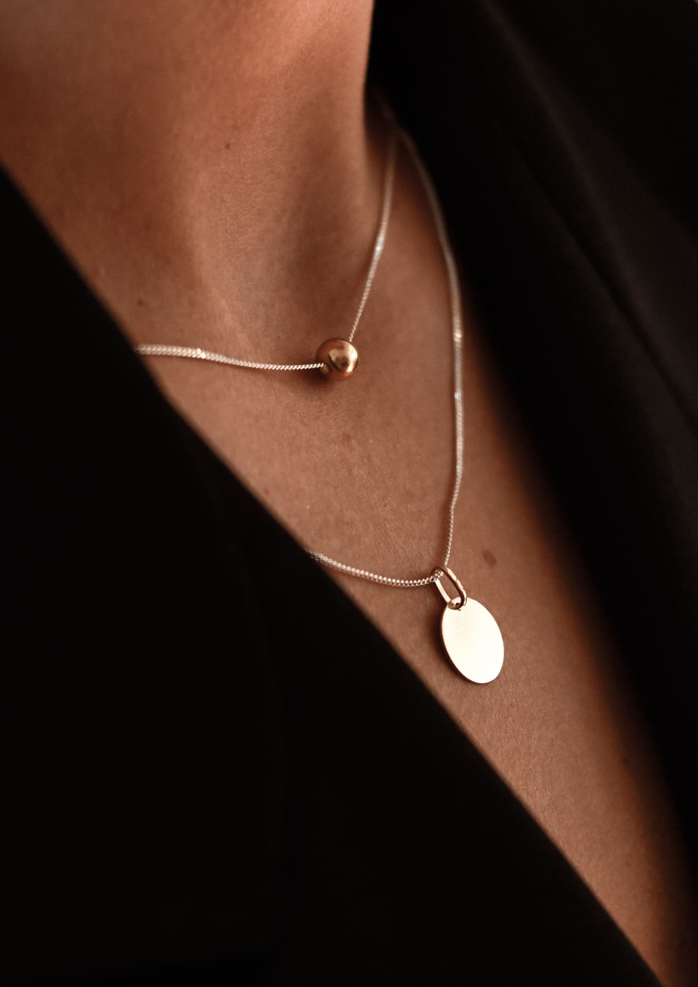 NO MORE accessories Bubble Necklace in sterling silver with gold plated pendant