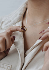 NO MORE accessories Circle Necklace in sterling silver with gold plated pendant